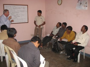 A group of Pastors from the Bible Presbyterian Churches in Delhi taking an in service professional development workshop - Rev Anjan Jena translating.